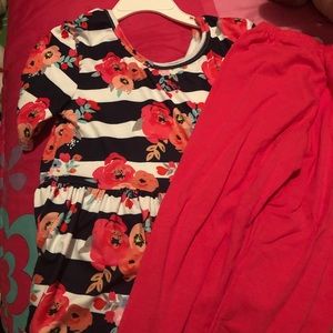 Flowered shirt with pink pants never worn